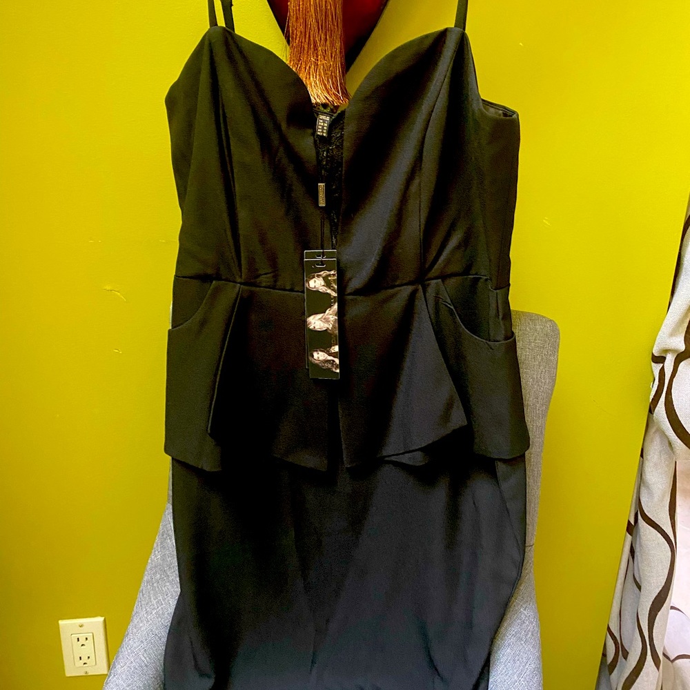 NWT Kardishian black peplum cocktail dress.